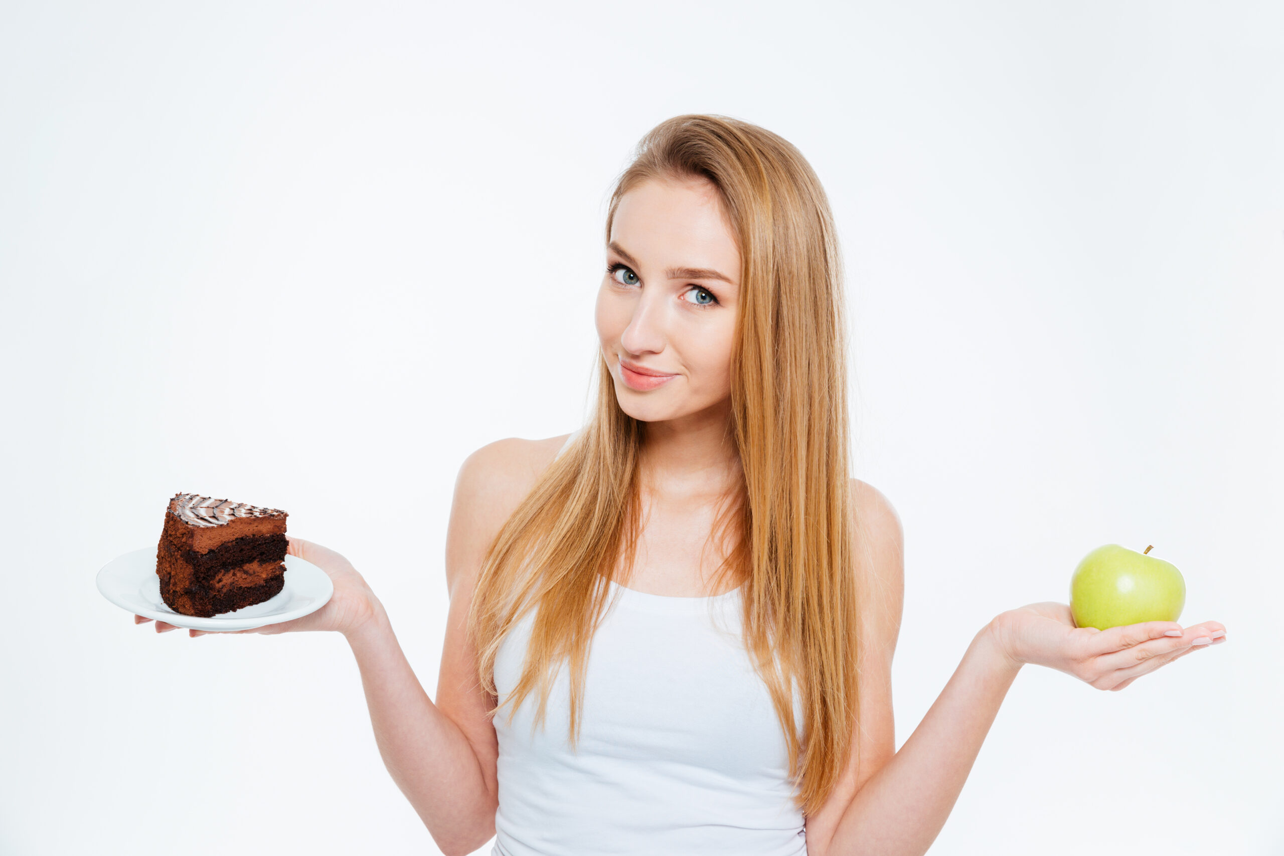 Attractive Woman Holding Healthy And Unhealthy Food