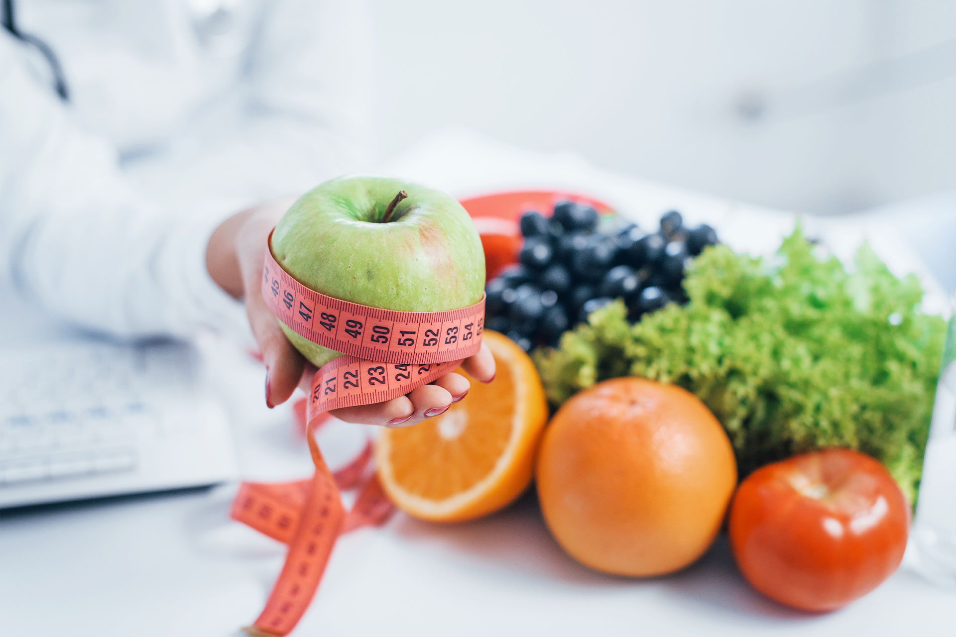 Female Nutritionist In White Coat Sitting Indoors 2021 08 28 22 40 37 Zw8w9tk.jpg