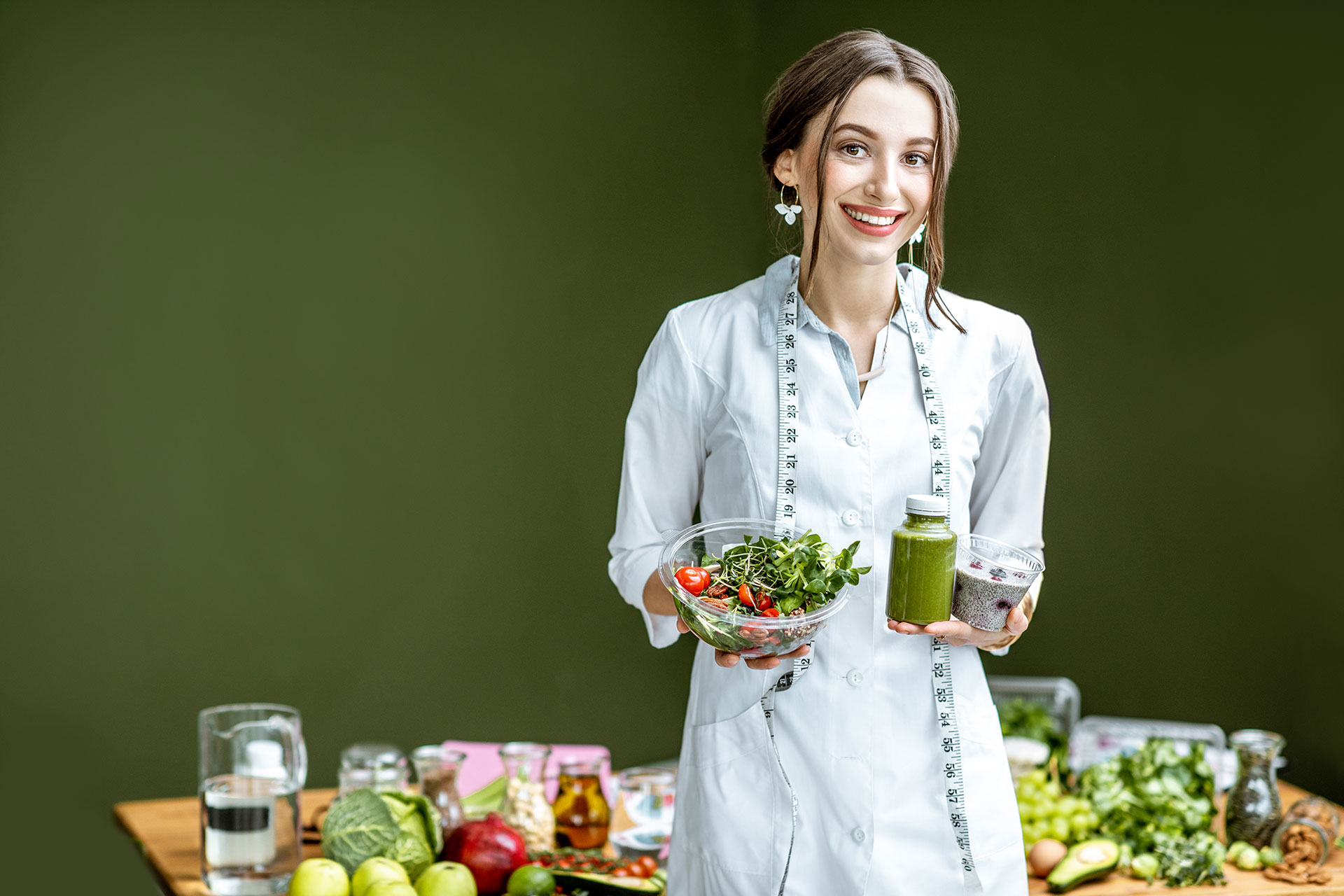 portrait of a woman nutritionist with healthy food 2021 11 02 20 15 35 EJ5U6CJ a