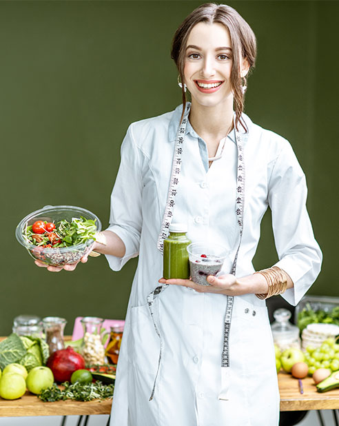 portrait of a woman nutritionist with healthy food 2022 02 04 03 04 00 QR9829T