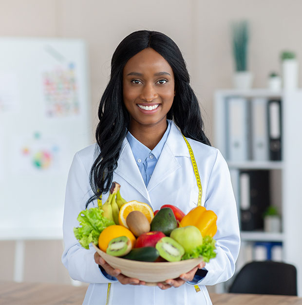 Portrait Of Happy Black Dietitian In Lab Coat Hold 2022 10 07 02 09 43 Ryry72x.jpg